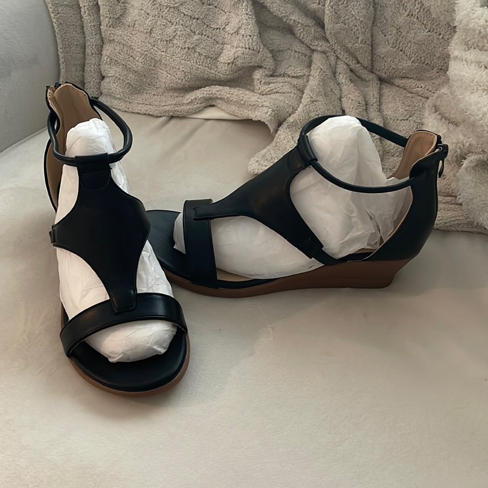 Black wedge sandal. NWOT